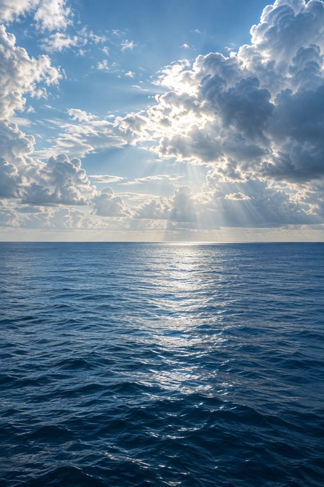 AI-generated illustration of clouds over a tropical ocean, not current weather